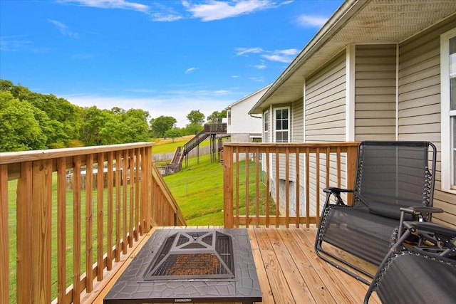 2129 Hollandale Cir, Columbia, TN 38401 - wooden deck with a fire pit