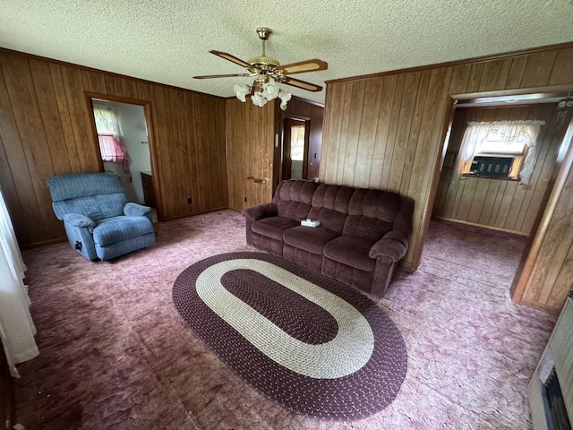 2168 Jefferson Rd, Smithville, TN 37166 - living area with carpet floors, a ceiling fan, wood walls, a textured ceiling, and cooling unit