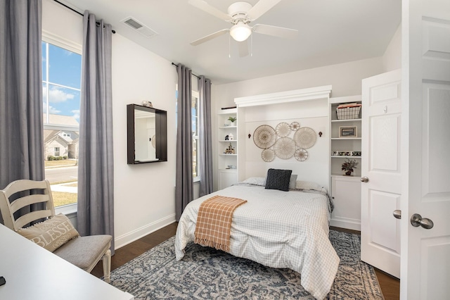 706 Hahn Ct, Lebanon, TN 37087 - bedroom with baseboards, dark wood-type flooring, and ceiling fan