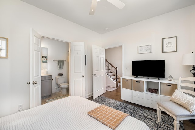 706 Hahn Ct, Lebanon, TN 37087 - bedroom with connected bathroom, baseboards, ceiling fan, dark wood-type flooring, and lofted ceiling