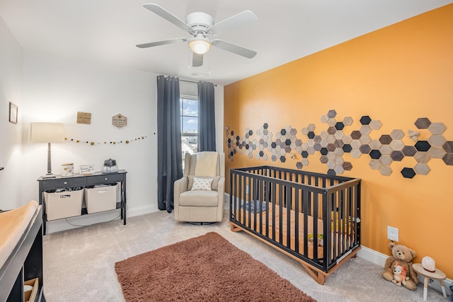 706 Hahn Ct, Lebanon, TN 37087 - bedroom with carpet floors, a ceiling fan, a crib, and baseboards