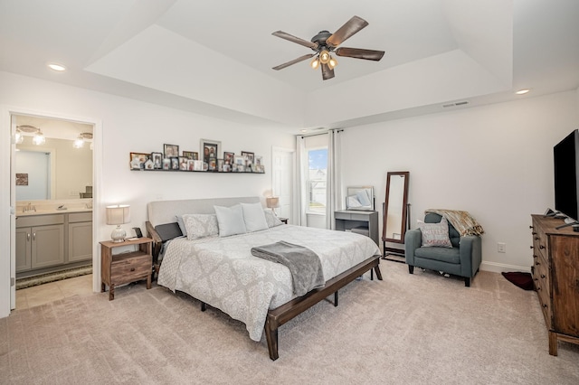706 Hahn Ct, Lebanon, TN 37087 - bedroom featuring light colored carpet, a tray ceiling, ensuite bath, recessed lighting, and a sink