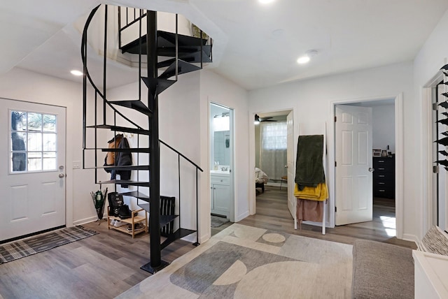 entrance foyer featuring light wood finished floors, stairs, recessed lighting, baseboards, and a ceiling fan