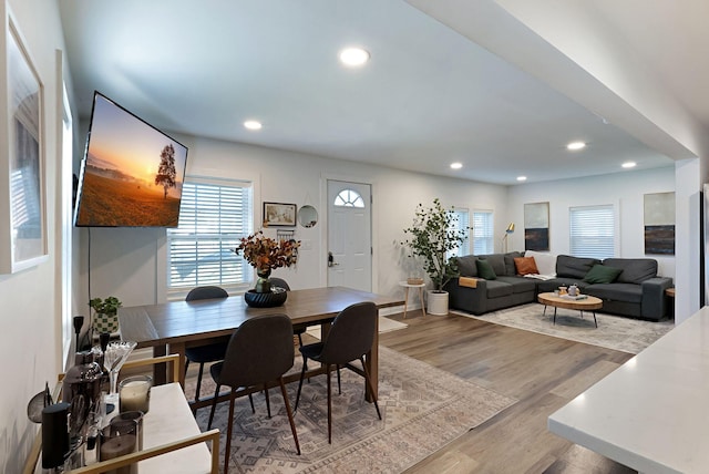 dining area featuring recessed lighting and light wood-style floors