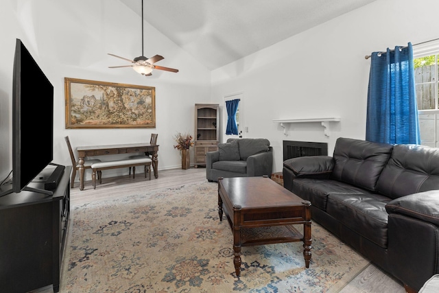 1129 W Main St Unit 21, Franklin, TN 37064 - living area with lofted ceiling, wood finished floors, a ceiling fan, a fireplace, and baseboards