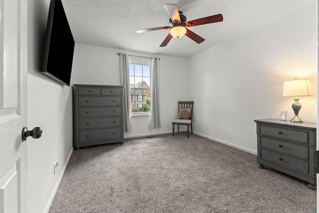 1129 W Main St Unit 21, Franklin, TN 37064 - carpeted bedroom featuring a textured ceiling, baseboards, and a ceiling fan