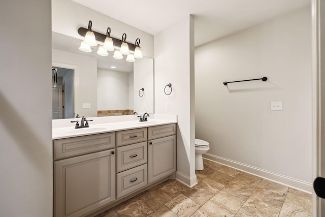 1403 Wade Hampton Ct, Lebanon, TN 37087 - full bathroom with toilet, baseboards, double vanity, and stone finish flooring