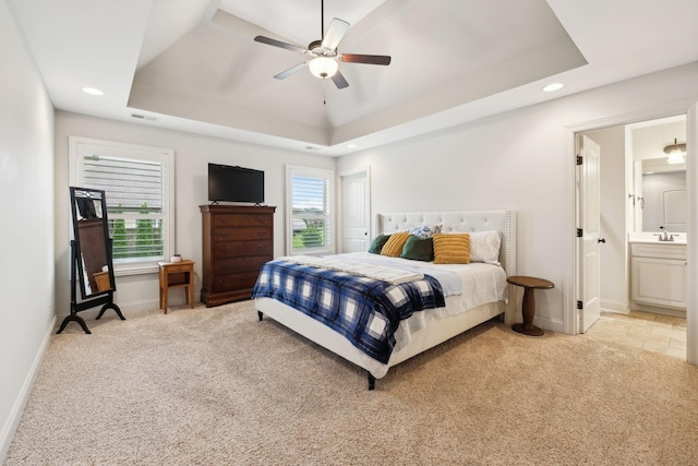 1403 Wade Hampton Ct, Lebanon, TN 37087 - bedroom with light colored carpet, a tray ceiling, baseboards, recessed lighting, and ensuite bathroom