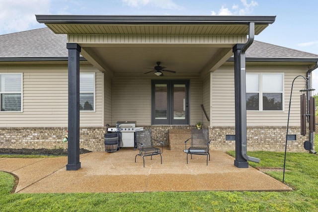 1403 Wade Hampton Ct, Lebanon, TN 37087 - back of property featuring a ceiling fan, a patio, a shingled roof, brick siding, and french doors