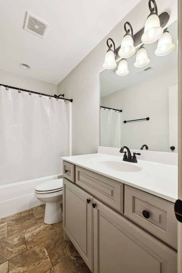 1403 Wade Hampton Ct, Lebanon, TN 37087 - full bath with toilet, vanity, stone finish floors, and shower / tub combo with curtain
