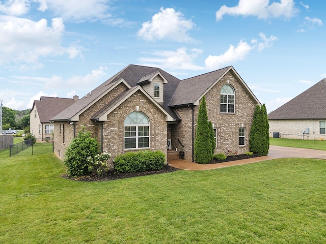 1403 Wade Hampton Ct, Lebanon, TN 37087 - traditional-style home with brick siding and roof with shingles