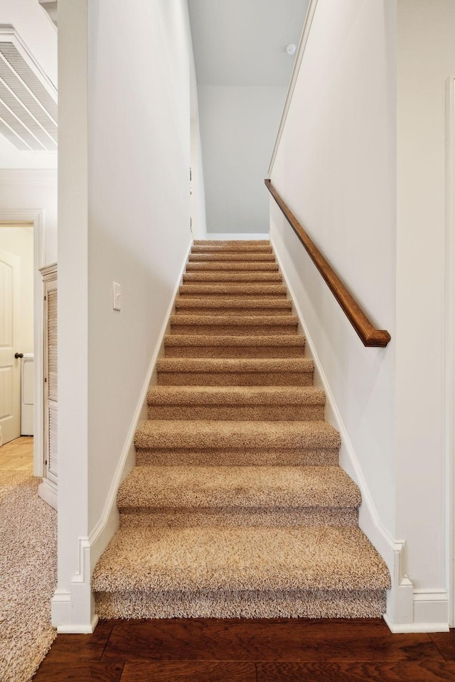1403 Wade Hampton Ct, Lebanon, TN 37087 - staircase with baseboards, washer / clothes dryer, and wood finished floors