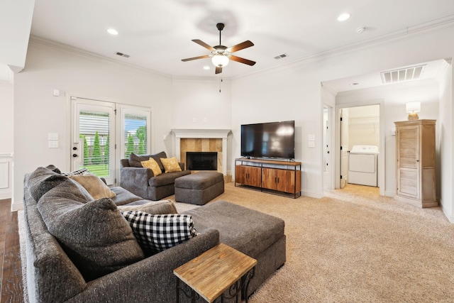 1403 Wade Hampton Ct, Lebanon, TN 37087 - living area featuring washer / clothes dryer, ceiling fan, crown molding, recessed lighting, and a tiled fireplace