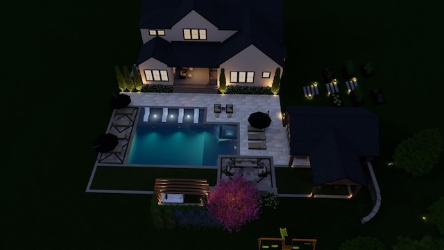 7361 Liberty Rd, Fairview, TN 37062 - back of house at twilight featuring an outdoor pool