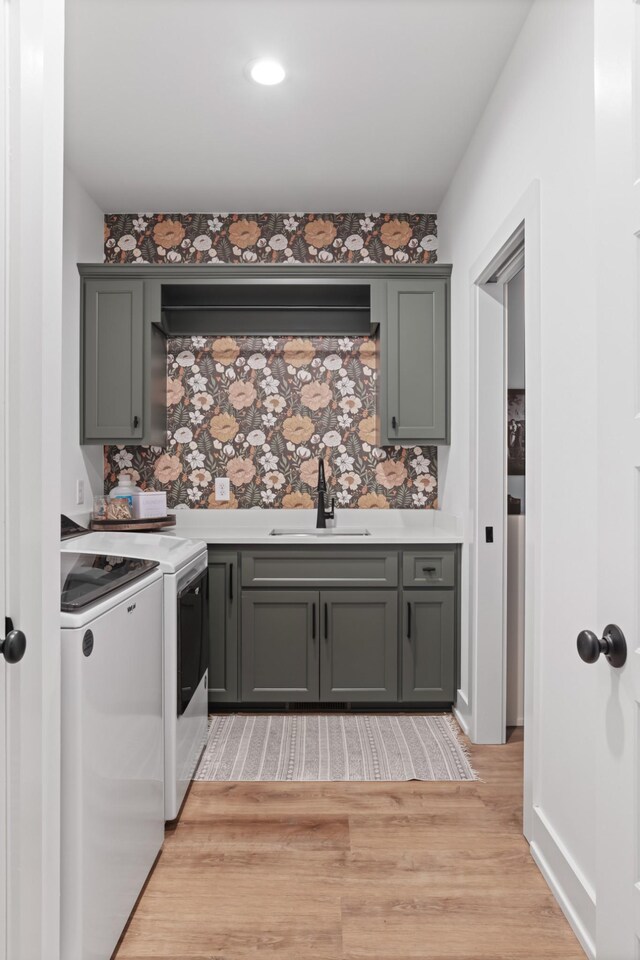7361 Liberty Rd, Fairview, TN 37062 - indoor wet bar with separate washer and dryer, light wood finished floors, and backsplash