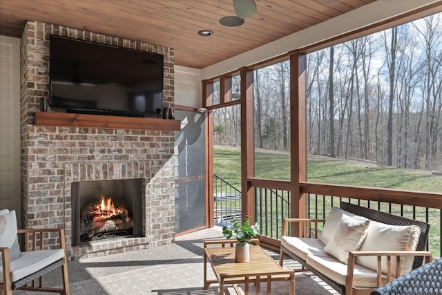 7361 Liberty Rd, Fairview, TN 37062 - sunroom / solarium featuring an outdoor living space with a fireplace