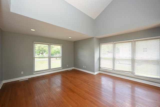 349 Marrell St, Gallatin, TN 37066 - empty room featuring baseboards, hardwood / wood-style flooring, vaulted ceiling, and recessed lighting