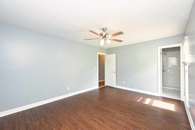 349 Marrell St, Gallatin, TN 37066 - unfurnished bedroom with dark wood-style floors, baseboards, ceiling fan, and connected bathroom