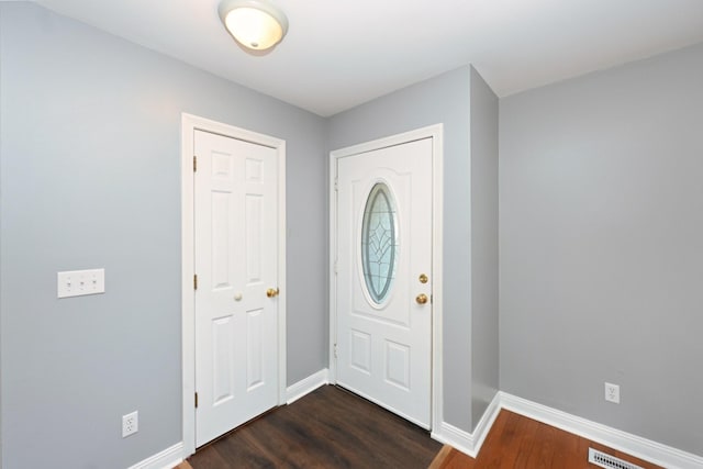 349 Marrell St, Gallatin, TN 37066 - entrance foyer with dark wood-style flooring and baseboards