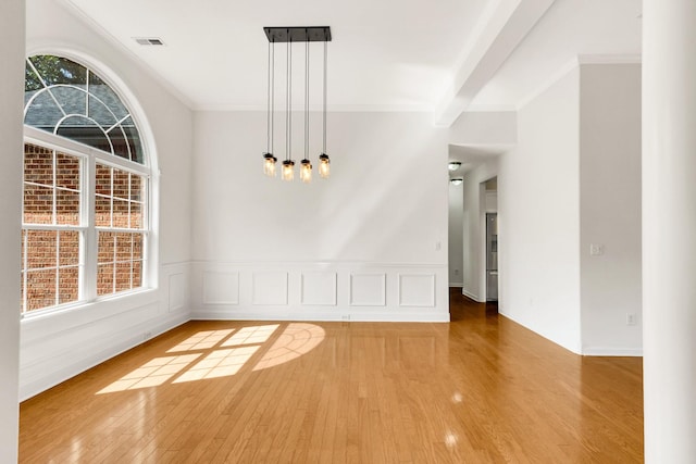 3015 Carpenters Pass, Spring Hill, TN 37174 - unfurnished dining area featuring ornamental molding, wood finished floors, and a chandelier