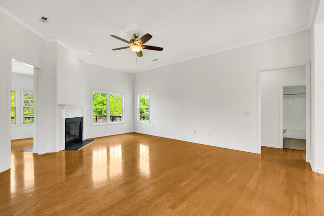 3015 Carpenters Pass, Spring Hill, TN 37174 - unfurnished living room featuring plenty of natural light, ceiling fan, crown molding, and wood finished floors