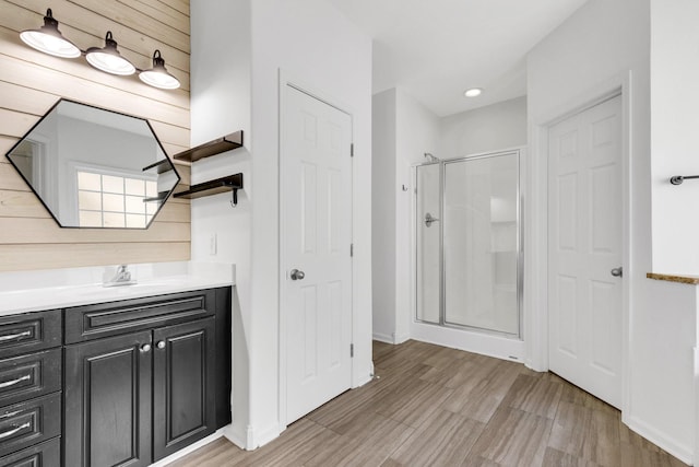 3015 Carpenters Pass, Spring Hill, TN 37174 - bathroom featuring a shower stall, vanity, and baseboards