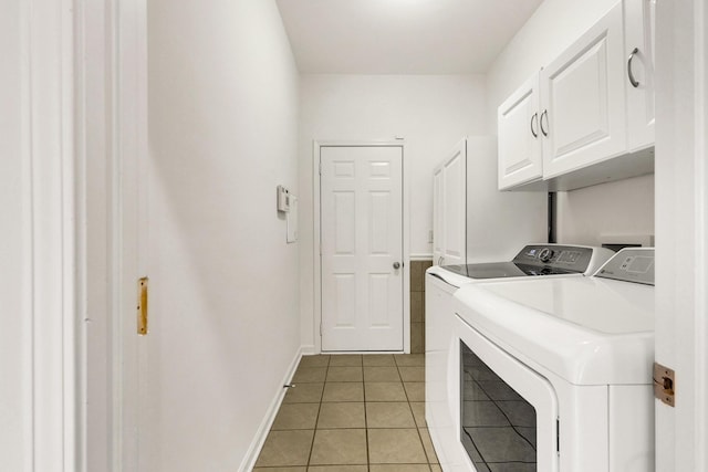3015 Carpenters Pass, Spring Hill, TN 37174 - laundry room featuring washer and clothes dryer, cabinet space, light tile patterned flooring, and baseboards