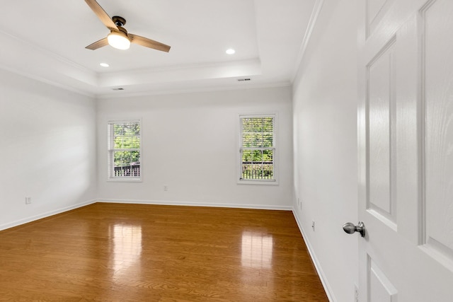3015 Carpenters Pass, Spring Hill, TN 37174 - empty room featuring plenty of natural light, ornamental molding, wood finished floors, a raised ceiling, and recessed lighting