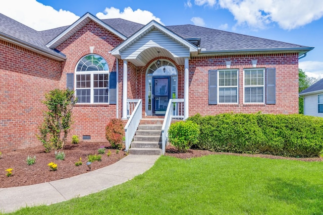 3015 Carpenters Pass, Spring Hill, TN 37174 - view of front facade featuring brick siding, a front yard, crawl space, and roof with shingles