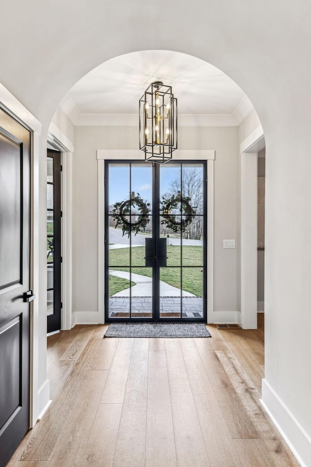 5012 Toll Road Ct, Thompsons Station, TN 37179 - foyer with ornamental molding, hardwood / wood-style flooring, plenty of natural light, and baseboards
