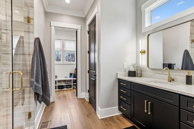 5012 Toll Road Ct, Thompsons Station, TN 37179 - bathroom with plenty of natural light, wood finished floors, a shower stall, vanity, and recessed lighting