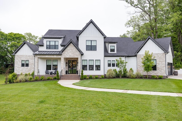 5012 Toll Road Ct, Thompsons Station, TN 37179 - modern farmhouse with board and batten siding, stone siding, a front lawn, and a standing seam roof