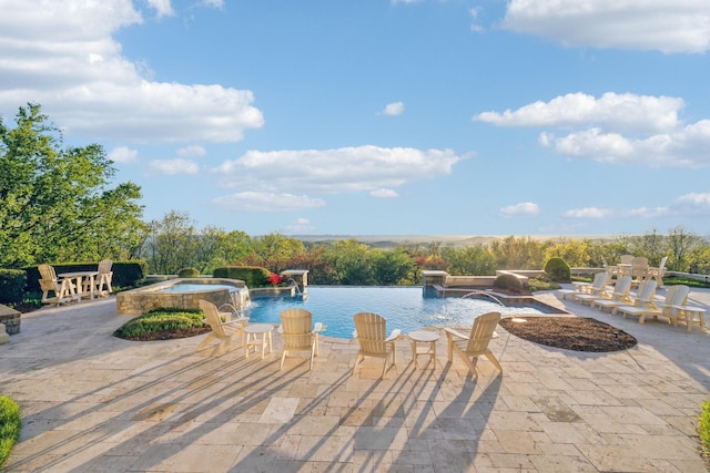 513 King Richards Ct, Franklin, TN 37067 - view of swimming pool featuring a patio area and a pool with connected hot tub
