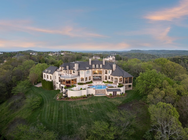 513 King Richards Ct, Franklin, TN 37067 - aerial view at dusk of view of pool and a wooded view