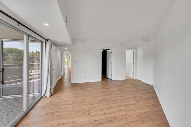 900 19th Ave S Unit 508, Nashville, TN 37212 - spare room featuring light wood-type flooring, baseboards, and recessed lighting