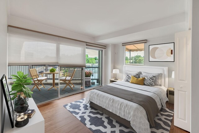 900 19th Ave S Unit 508, Nashville, TN 37212 - bedroom with wood finished floors and access to exterior
