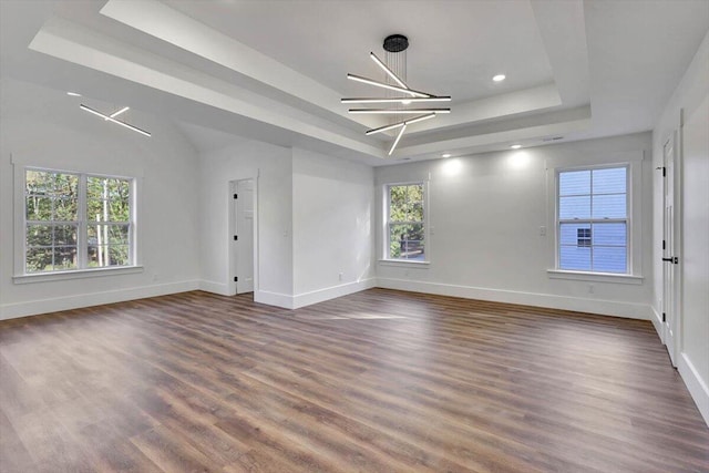 7592 Grasshopper Rd, Georgetown, TN 37336 - empty room featuring a tray ceiling, baseboards, dark wood finished floors, and recessed lighting