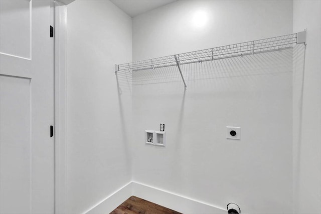 7592 Grasshopper Rd, Georgetown, TN 37336 - washroom with washer hookup, hookup for an electric dryer, dark wood-style floors, and baseboards