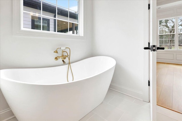 8650 Becket Way Lot # 4, Ooltewah, TN 37363 - bathroom featuring baseboards, a freestanding bath, and tile patterned flooring