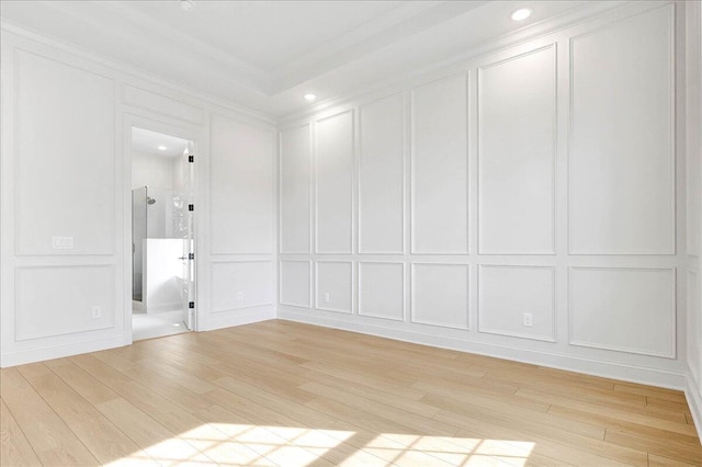 8650 Becket Way Lot # 4, Ooltewah, TN 37363 - spare room with a decorative wall, ornamental molding, light wood-style flooring, and recessed lighting