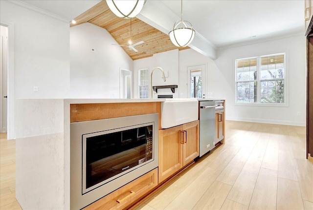 8650 Becket Way Lot # 4, Ooltewah, TN 37363 - kitchen with stainless steel appliances, a sink, pendant lighting, light wood-style flooring, and crown molding