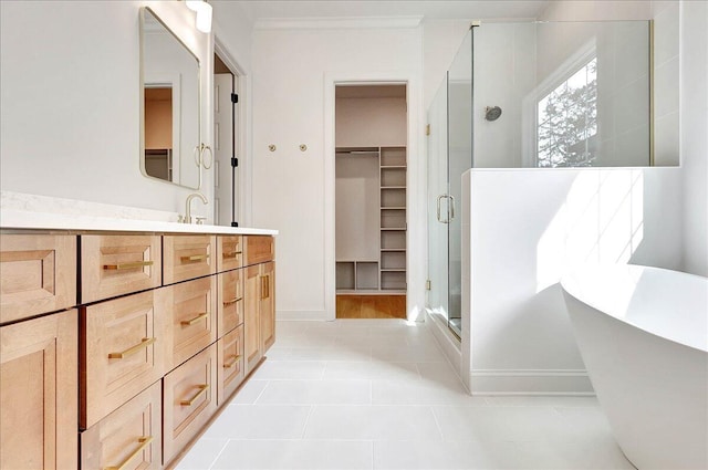 8650 Becket Way Lot # 4, Ooltewah, TN 37363 - bathroom with a stall shower, a spacious closet, vanity, a freestanding bath, and baseboards