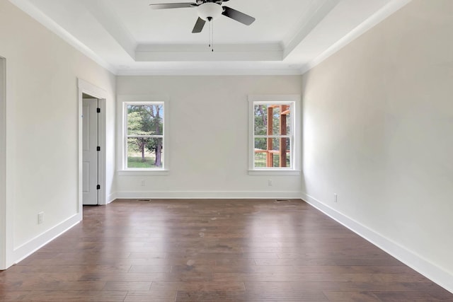 7383 Gamble Rd Lot # 5, Georgetown, TN 37336 - empty room with a tray ceiling, ceiling fan, ornamental molding, dark wood-type flooring, and baseboards