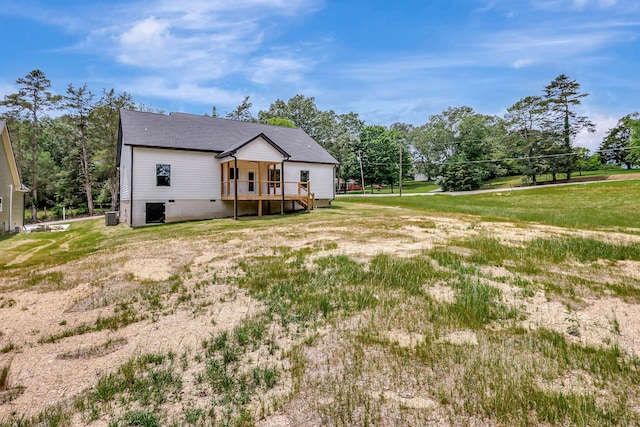 7383 Gamble Rd Lot # 5, Georgetown, TN 37336 - back of house featuring central AC, view of scattered trees, and a lawn