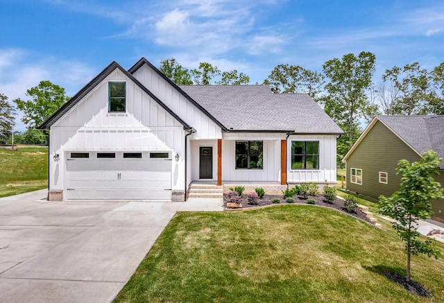 7383 Gamble Rd Lot # 5, Georgetown, TN 37336 - modern farmhouse featuring board and batten siding, a shingled roof, driveway, and a front yard
