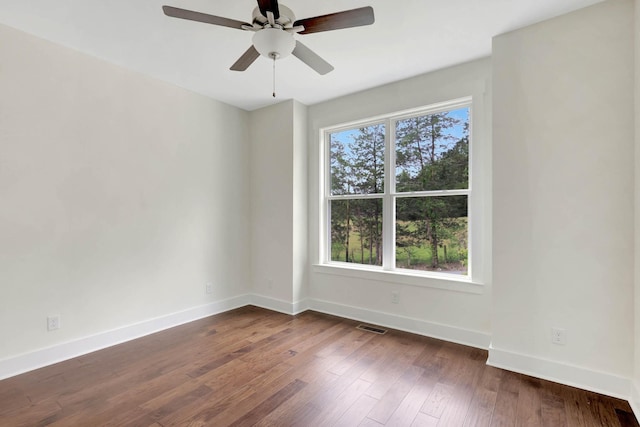 7387 Gamble Rd Lot # 4, Georgetown, TN 37336 - unfurnished room featuring baseboards, dark wood-type flooring, and a ceiling fan