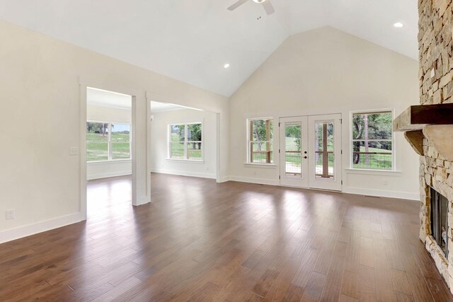 7387 Gamble Rd Lot # 4, Georgetown, TN 37336 - unfurnished living room with ceiling fan, a stone fireplace, plenty of natural light, high vaulted ceiling, and dark wood finished floors