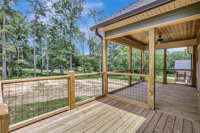 7387 Gamble Rd Lot # 4, Georgetown, TN 37336 - wooden terrace with a ceiling fan and view of wooded area