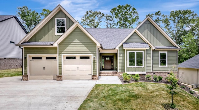 7387 Gamble Rd Lot # 4, Georgetown, TN 37336 - craftsman-style home with board and batten siding, concrete driveway, a front lawn, an attached garage, and a shingled roof