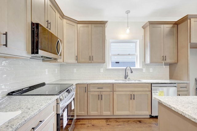 7387 Gamble Rd Lot # 4, Georgetown, TN 37336 - kitchen featuring stainless steel appliances, a sink, decorative backsplash, and light stone countertops